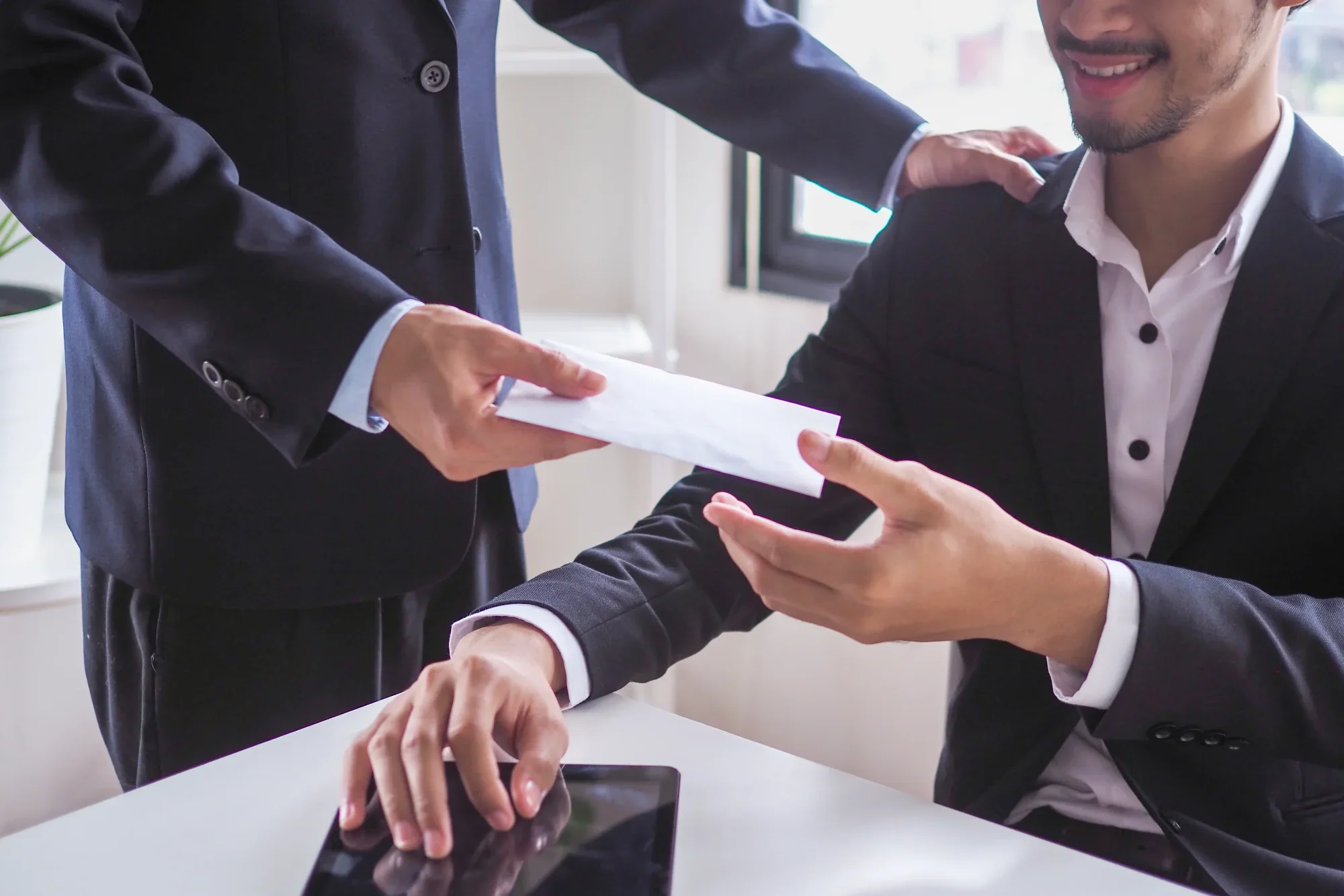managers are accepting bonus envelopes from the ceo after